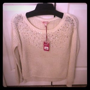 Candie’s holiday sweater